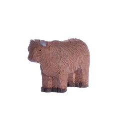 HIGHLAND COW IN WOOD